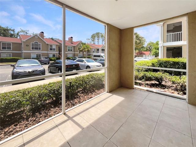 sunroom with a residential view
