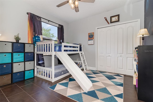 bedroom with a ceiling fan and a closet