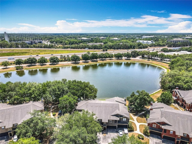 bird's eye view with a water view and a residential view