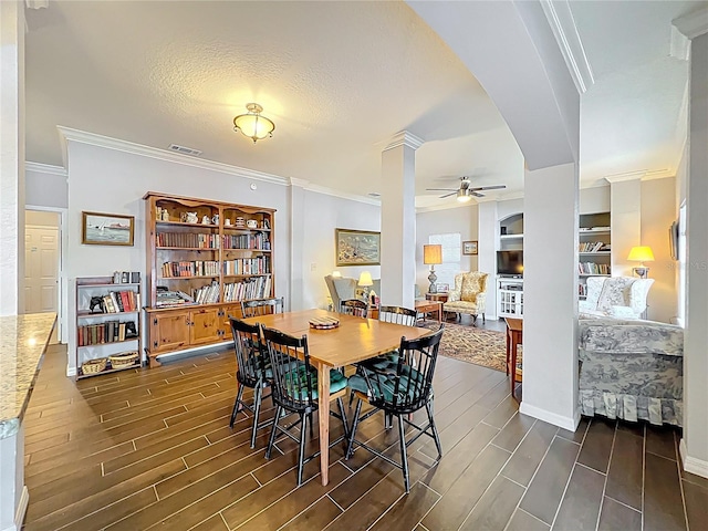 dining space with crown molding, a ceiling fan, and wood finish floors