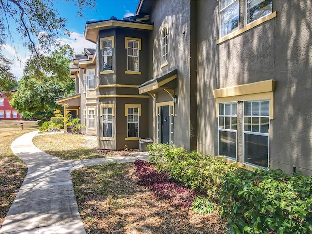 exterior space featuring stucco siding