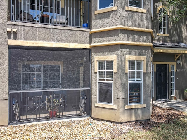 property entrance with a balcony