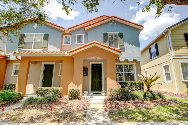 7348 Yoder St, Windermere, FL 34786 - mediterranean / spanish home featuring stucco siding and a tiled roof