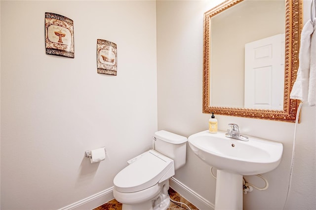 7348 Yoder St, Windermere, FL 34786 - half bath featuring toilet and baseboards