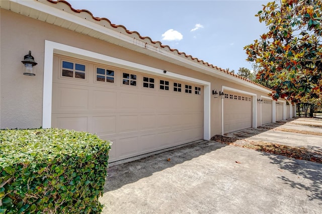 7348 Yoder St, Windermere, FL 34786 - garage featuring concrete driveway