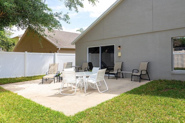 view of patio with fence