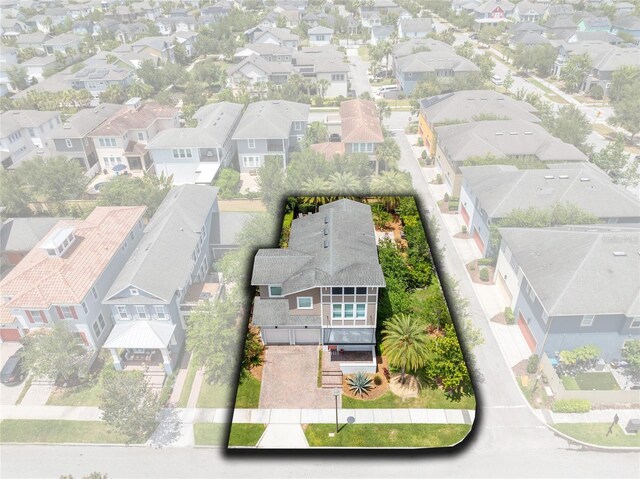 8263 Bellow St, Orlando, FL 32827 - drone / aerial view featuring a residential view