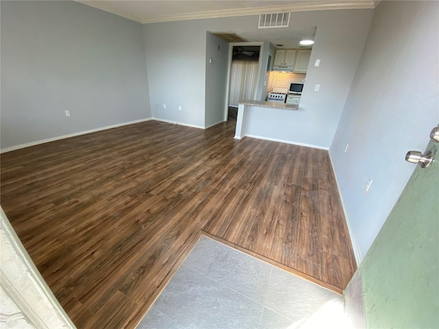 122 Water Front Way Unit 360, Altamonte Springs, FL 32701 - unfurnished living room featuring ornamental molding, dark wood-type flooring, and visible vents