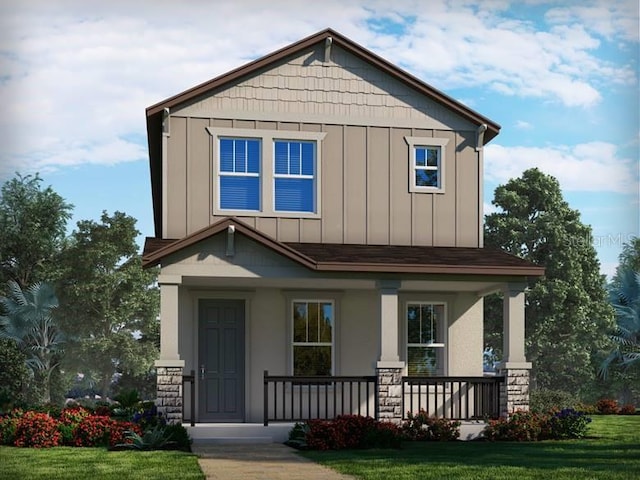 craftsman-style house with board and batten siding, a porch, stone siding, and a front yard