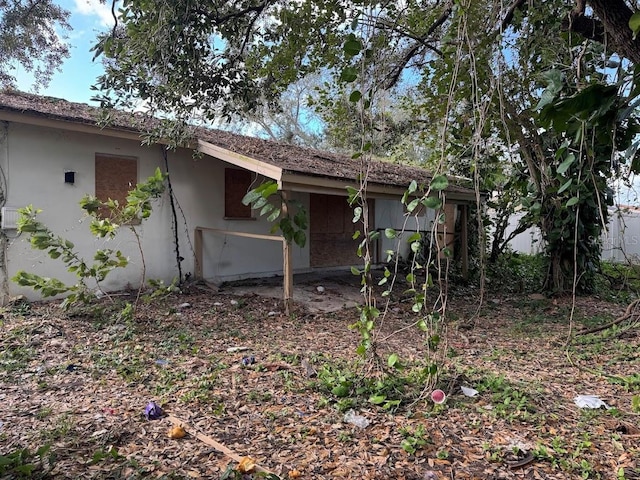view of property exterior with stucco siding