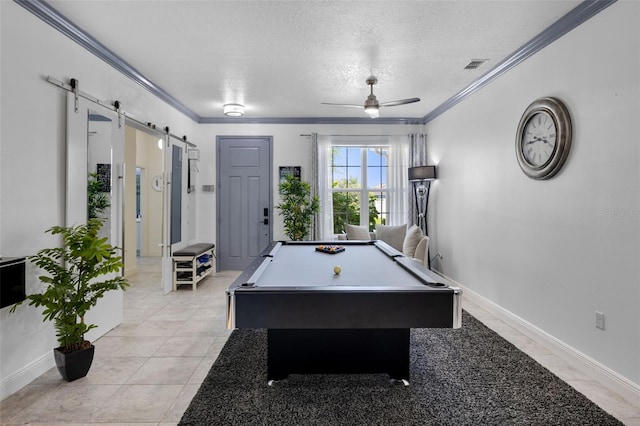 recreation room featuring visible vents, a ceiling fan, crown molding, a barn door, and billiards