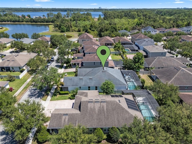 aerial view with a residential view and a water view