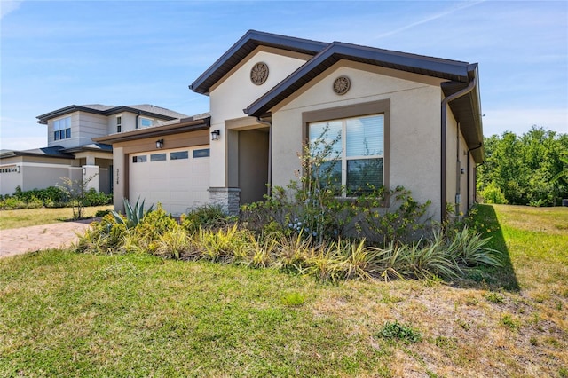 3128 Oxbow Ct, Harmony, FL 34773 - ranch-style house featuring a garage, driveway, a front lawn, and stucco siding