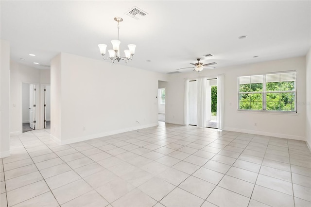 3128 Oxbow Ct, Harmony, FL 34773 - empty room featuring visible vents, baseboards, recessed lighting, ceiling fan with notable chandelier, and light tile patterned floors