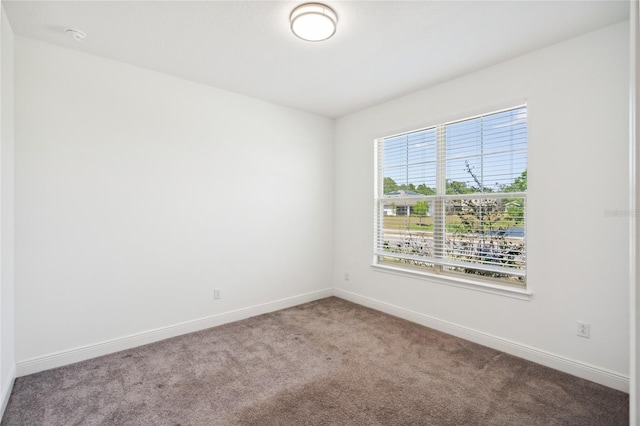 3128 Oxbow Ct, Harmony, FL 34773 - carpeted spare room with baseboards