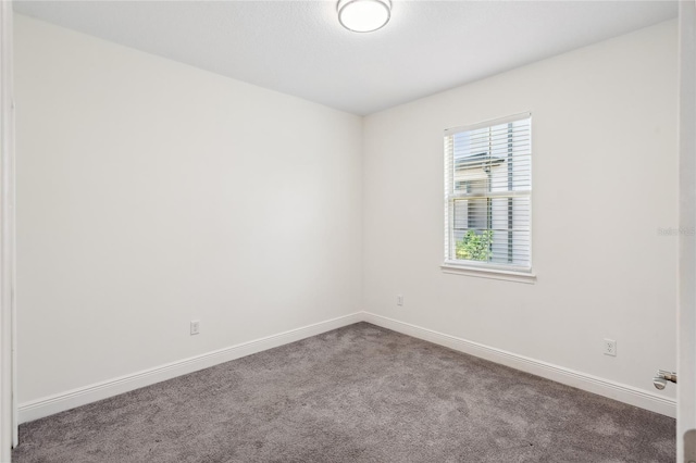 3128 Oxbow Ct, Harmony, FL 34773 - carpeted empty room with baseboards
