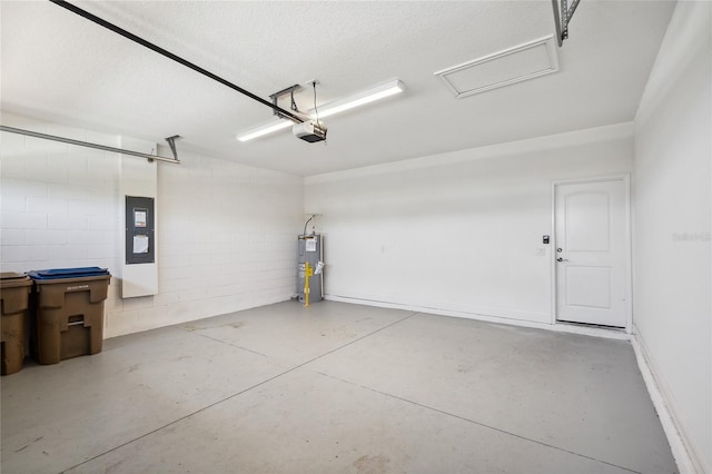 3128 Oxbow Ct, Harmony, FL 34773 - garage with a garage door opener, electric panel, concrete block wall, and electric water heater