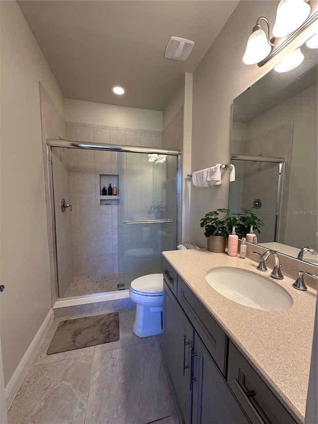 bathroom with visible vents, vanity, toilet, recessed lighting, and a stall shower