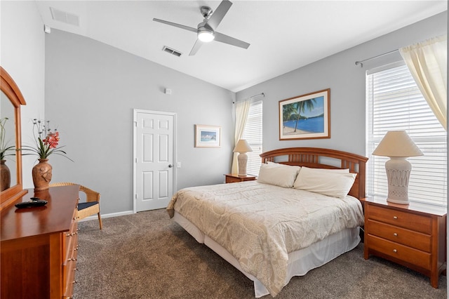 bedroom with carpet floors, multiple windows, lofted ceiling, and visible vents
