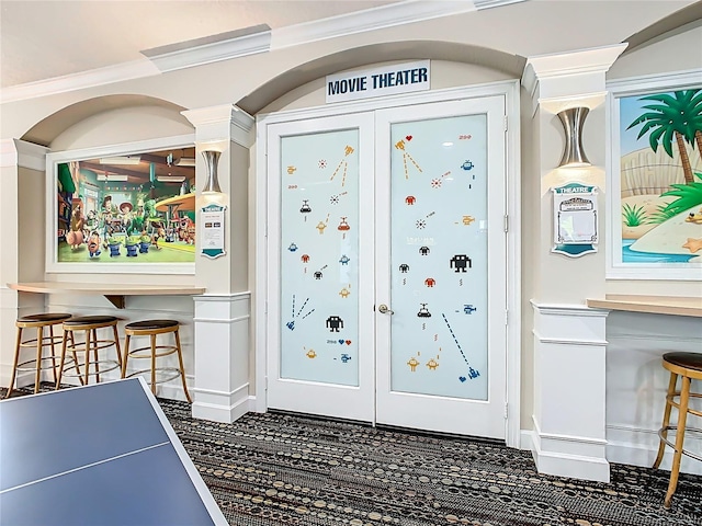 doorway to outside with baseboards