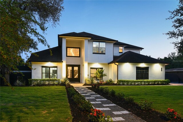 1840 Bryan Ave, Winter Park, FL 32789 - view of front of house with stucco siding and a front lawn