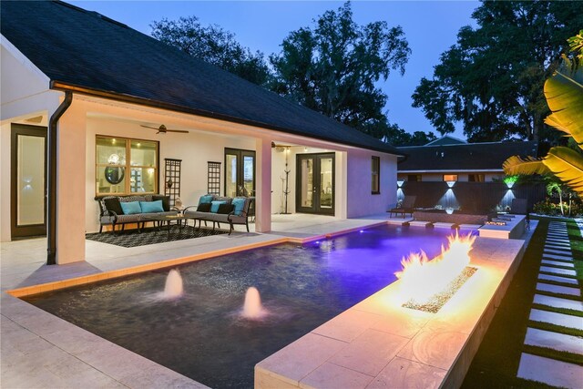 1840 Bryan Ave, Winter Park, FL 32789 - outdoor pool with an outdoor living space with a fire pit, fence, a patio, french doors, and a ceiling fan