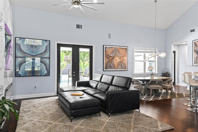 1840 Bryan Ave, Winter Park, FL 32789 - living area with ceiling fan with notable chandelier, lofted ceiling, hardwood / wood-style floors, and visible vents