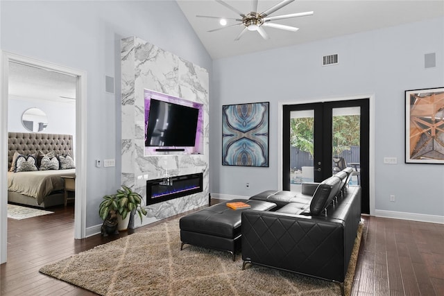 1840 Bryan Ave, Winter Park, FL 32789 - living area featuring visible vents, a fireplace, ceiling fan, high vaulted ceiling, and dark wood-type flooring