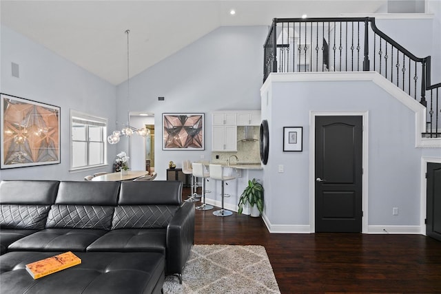 1840 Bryan Ave, Winter Park, FL 32789 - living area with dark wood-style flooring, baseboards, high vaulted ceiling, stairway, and recessed lighting