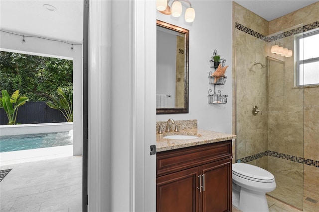 1840 Bryan Ave, Winter Park, FL 32789 - bathroom with vanity, a tile shower, and toilet