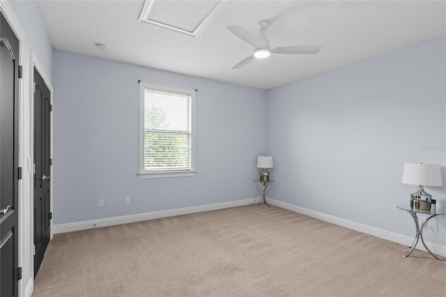1840 Bryan Ave, Winter Park, FL 32789 - spare room featuring light colored carpet, attic access, baseboards, and ceiling fan