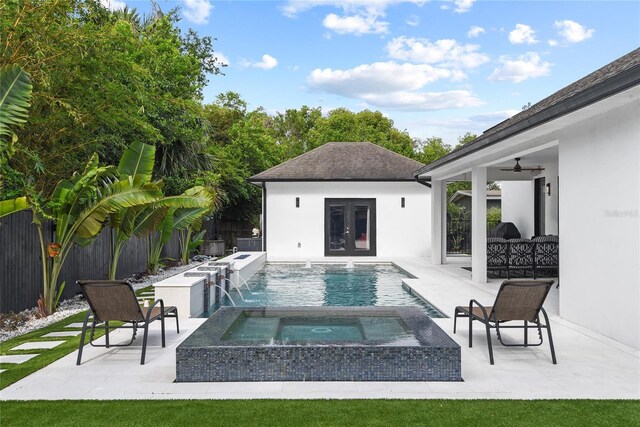 1840 Bryan Ave, Winter Park, FL 32789 - view of swimming pool with ceiling fan, a fenced in pool, a fenced backyard, an in ground hot tub, and a patio area