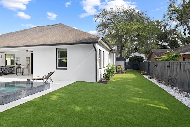 1840 Bryan Ave, Winter Park, FL 32789 - back of property with roof with shingles, a patio area, a fenced backyard, a yard, and stucco siding