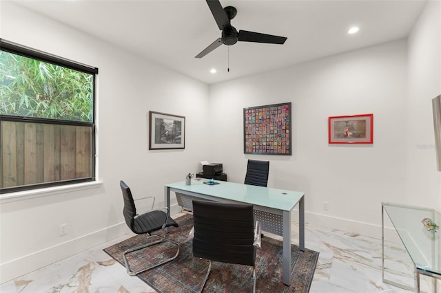 home office featuring baseboards, recessed lighting, and marble finish floor