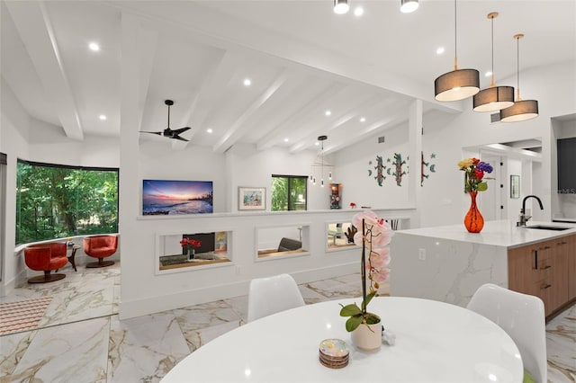 dining space with marble finish floor, baseboards, ceiling fan, recessed lighting, and lofted ceiling with beams