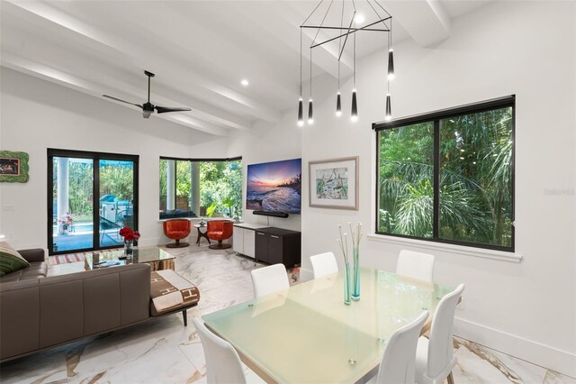 dining space with baseboards, recessed lighting, beam ceiling, and marble finish floor