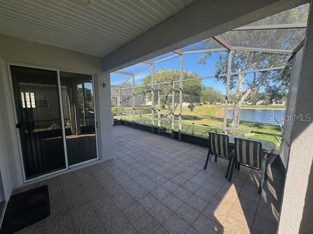 10414 Andover Point Cir, Orlando, FL 32825 - view of patio with a water view and a lanai
