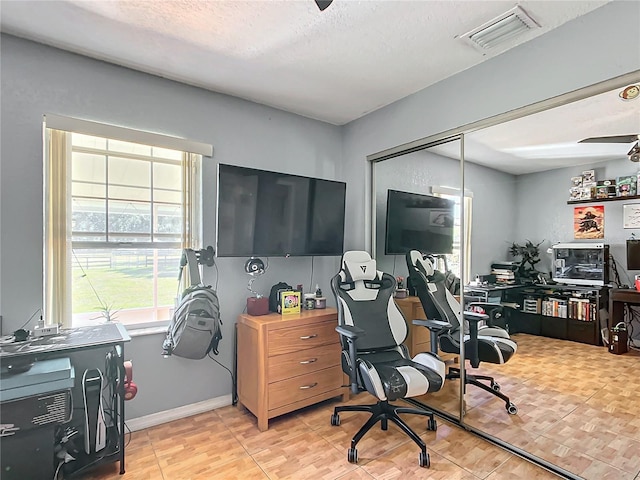 1072 SE 155th St, Summerfield, FL 34491 - office area featuring ceiling fan, a textured ceiling, and visible vents