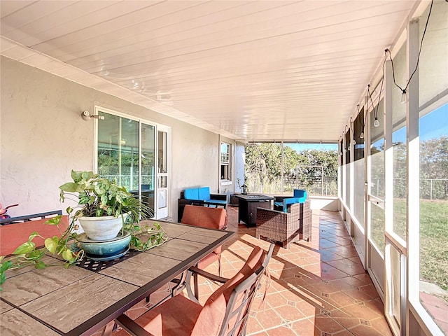 1072 SE 155th St, Summerfield, FL 34491 - sunroom / solarium featuring outdoor dining space and tile patterned floors