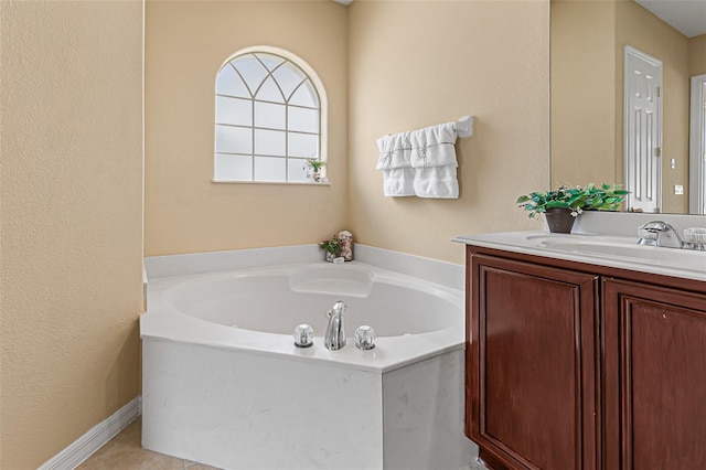 full bathroom with vanity and a bath