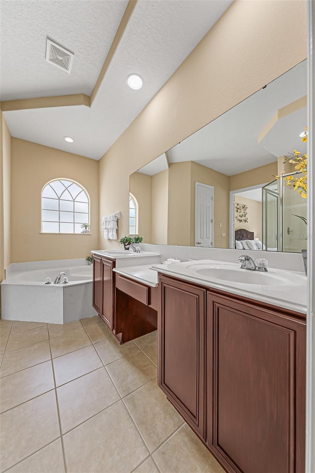 full bath with visible vents, a garden tub, vanity, tile patterned floors, and a stall shower