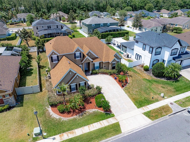 birds eye view of property with a residential view