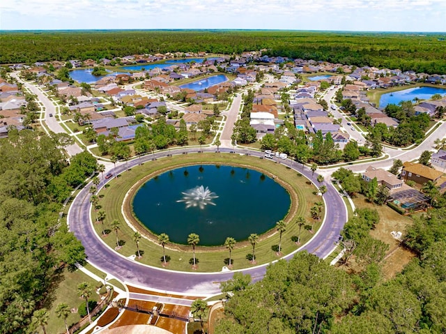 bird's eye view with a water view and a residential view