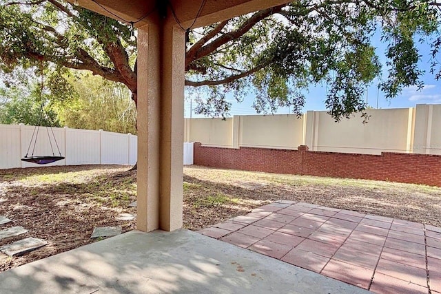 view of patio featuring a fenced backyard