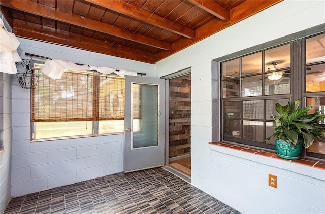 exterior space with concrete block siding