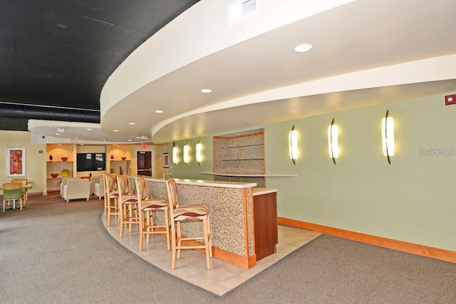 155 S Court Ave Unit 1305, Orlando, FL 32801 - interior space featuring recessed lighting, visible vents, a dry bar, and tile patterned flooring