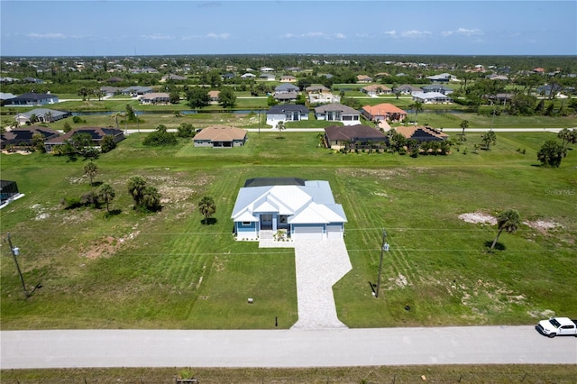 261 Rotonda Blvd S, Rotonda West, FL 33947 - aerial perspective of suburban area