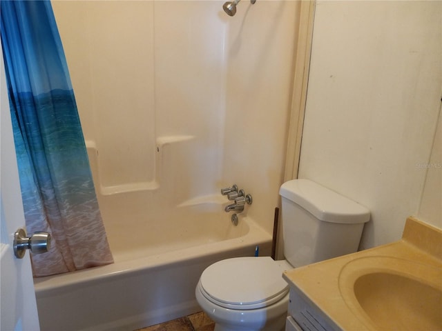 bathroom with vanity, toilet, and shower / bath combination with curtain