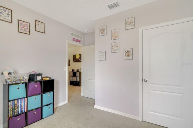 rec room featuring carpet flooring and baseboards