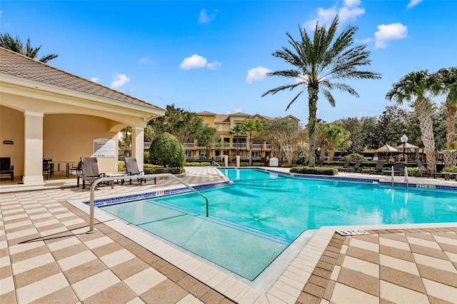 community pool featuring a patio